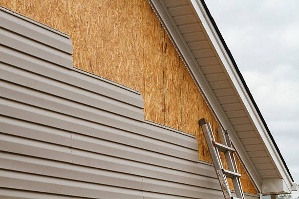 Professional Siding Contractor technician working in Olanta, PA